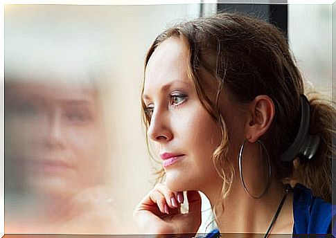 Woman looking out the window