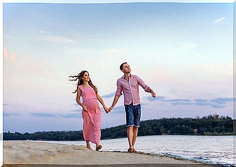 Couple walking on the beach