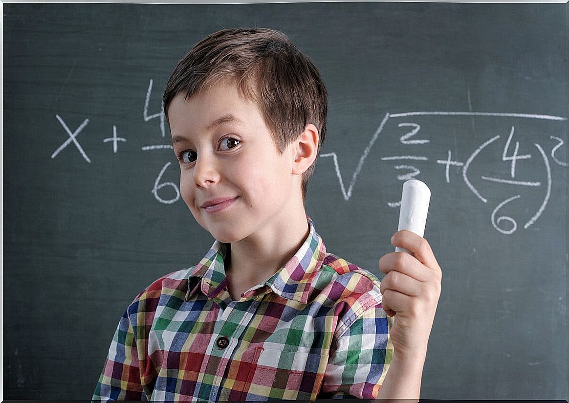 Boy solving an equation