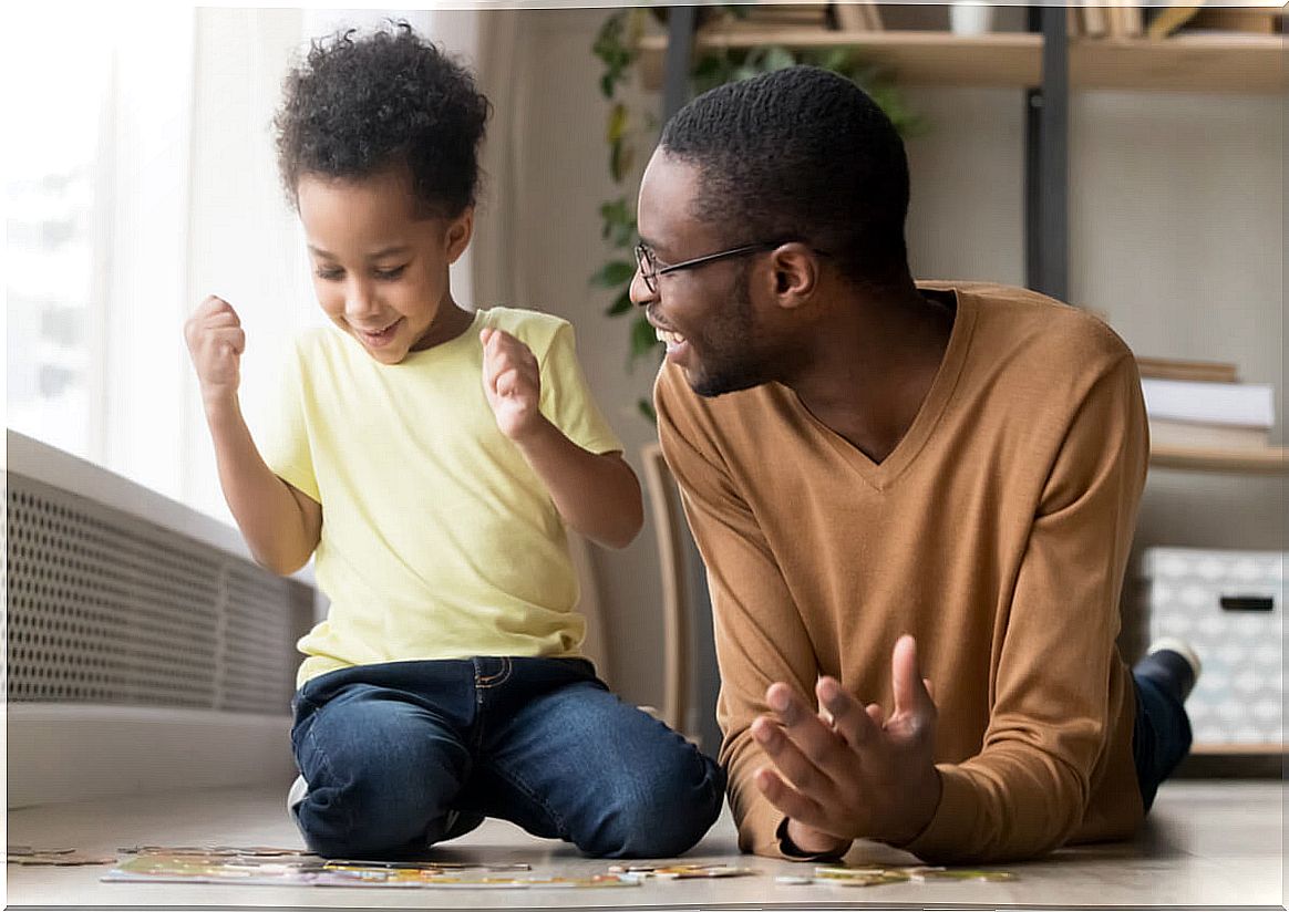 Father playing with his son