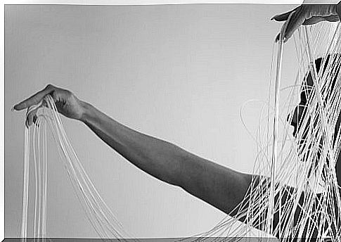 Woman with strings in her hands representing the need to give yourself permission to change, heal, connect with you