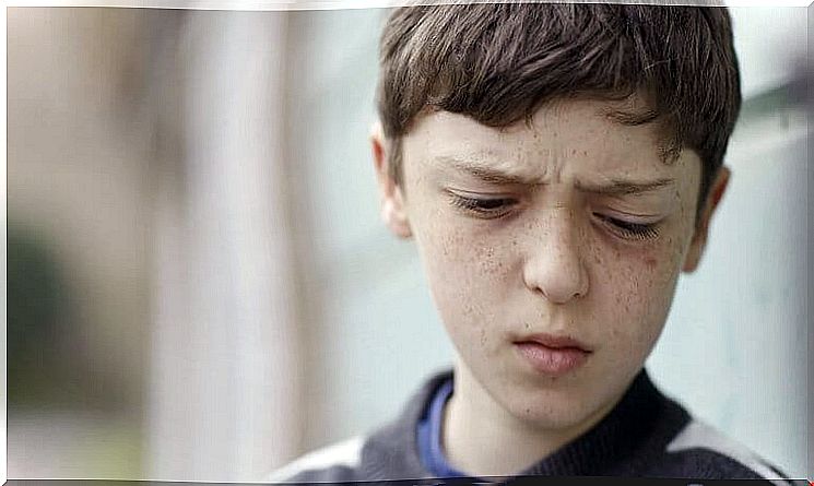 Boy with sad expression