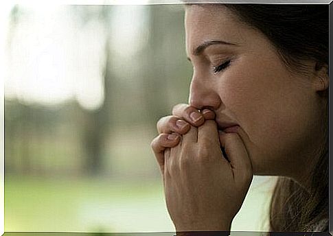 Woman crying over primal wound