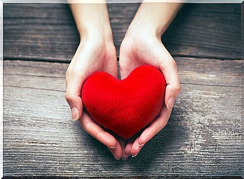 Hands with a heart showing the benefits of volunteering