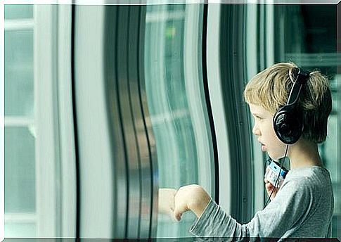 Child with Asperger's listening to music