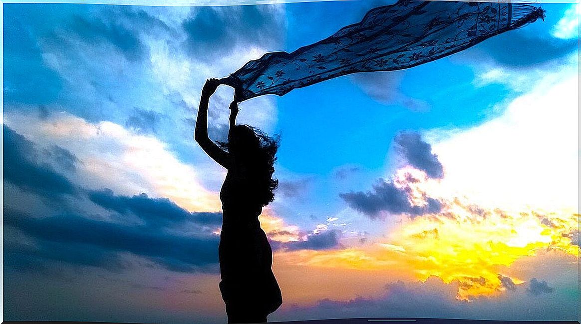 Girl holding a veil