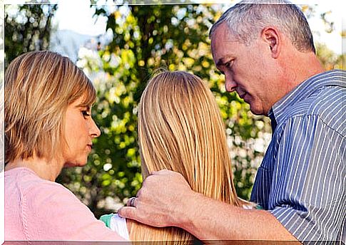 Parents with their teenage daughter